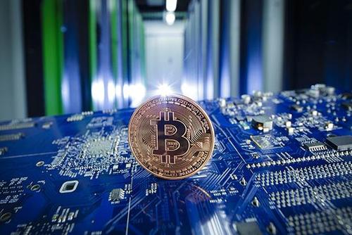 著名比特币多头“木头姐”下调目标价因为稳定币的“取代”